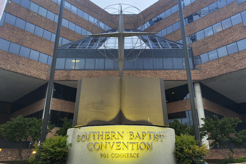 FILE - A cross and Bible sculpture stand outside the Southern Baptist Convention headquarters in Nashville, Tenn., May 24, 2022. On Tuesday, Sept. 20, 2022, the Southern Baptists' top administrative body voted to cut ties with two congregations: an LGBTQ-friendly church in North Carolina that had itself quit the denomination decades earlier and a New Jersey congregation it cited for “alleged discriminatory behavior.” (AP Photo/Holly Meyer, File)
