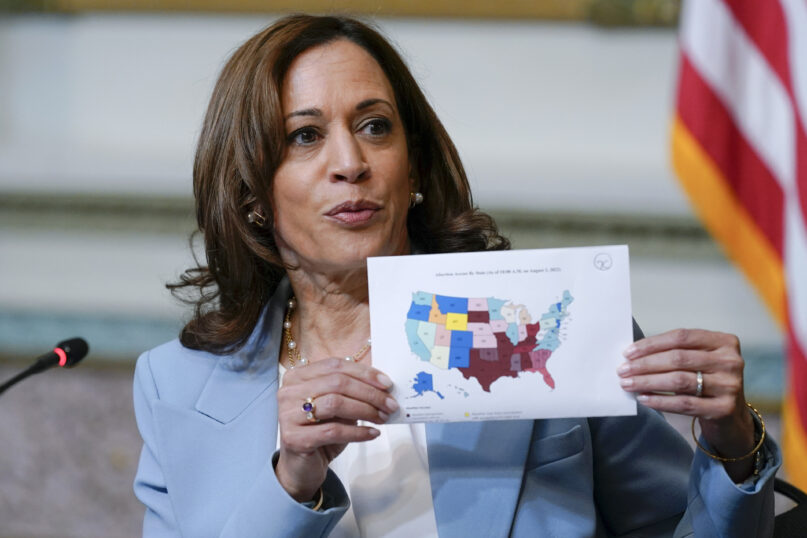 FILE - Vice President Kamala Harris displays a map showing abortion access by state as she speaks during the first meeting of the interagency Task Force on Reproductive Healthcare Access in the Indian Treaty Room in the Eisenhower Executive Office Building on the White House Campus in Washington, Aug. 3, 2022. Harris when speaking about abortion told voters in Illinois earlier this month that “extremist, so-called leaders trumpet the rhetoric of freedom while they take away freedoms.” (AP Photo/Susan Walsh, File)