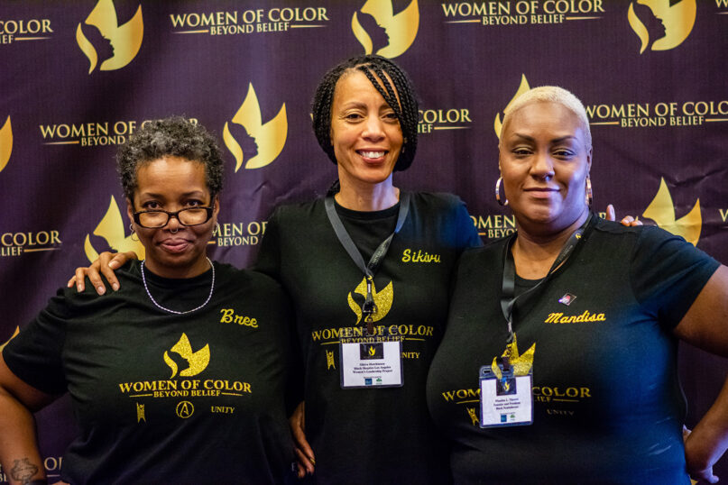 Women of Color Beyond Belief Conference organizers Bridgett “Bria” Crutchfield, from left, Sikivu Hutchinson and Mandisa Thomas pose together during the group’s meeting in 2019 in Chicago. Photo by Josiah Mannion, courtesy of WOCBB
