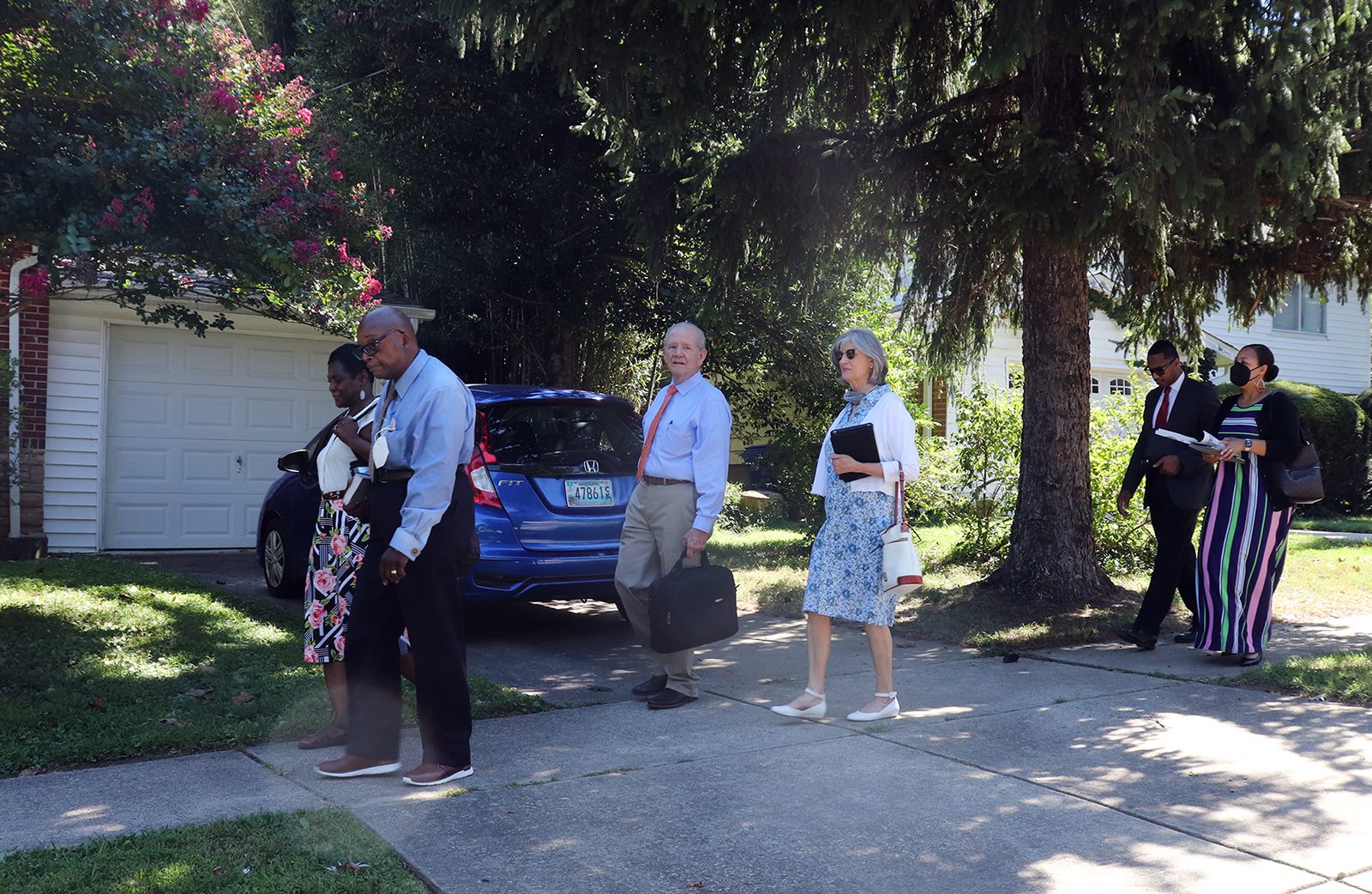 A group of Jehovah’s Witnesses from the Kingdom Hall in Silver Spring, Maryland, returned to door knocking in in their community on Thursday, Sept. 1, 2022. RNS photo by Adelle M. Banks