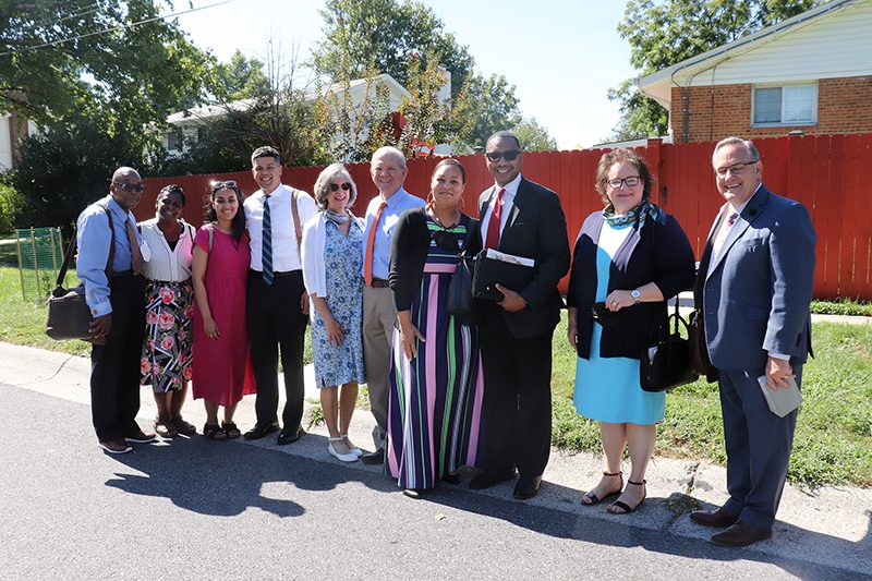 A group of Jehovah’s Witnesses from the Kingdom Hall in Silver Spring, Maryland, pose for a picture after door knocking in their community on Thursday, Sept. 1, 2022. RNS photo by Adelle M. Banks