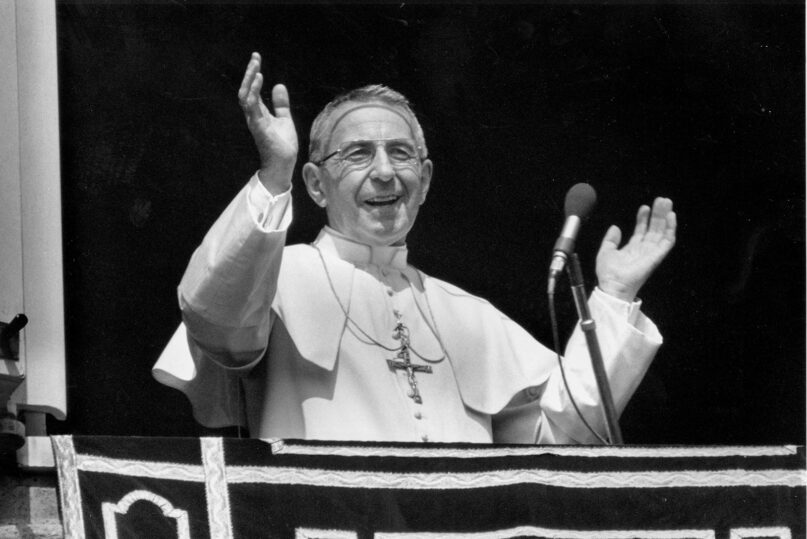 FILE - Pope John Paul I smiles at a crowd of thousands during a traditional Sunday noon blessing from his studio's window overlooking St. Peter's Square at the Vatican in this Sept. 1978 photo. On Sunday, Sept. 4, 2022, Pope Francis will beatify John Paul I, the last formal step on the path to possible sainthood. (AP Photo)