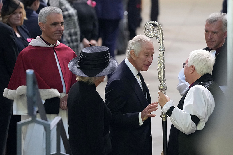 Britain's King Charles III and Camilla, the Queen Consort, leave after a Service of Prayer and Reflection for the life of Queen Elizabeth II, at Llandaff Cathedral in Cardiff, Wales, Friday Sept. 16, 2022. (AP Photo/Frank Augstein, Pool)