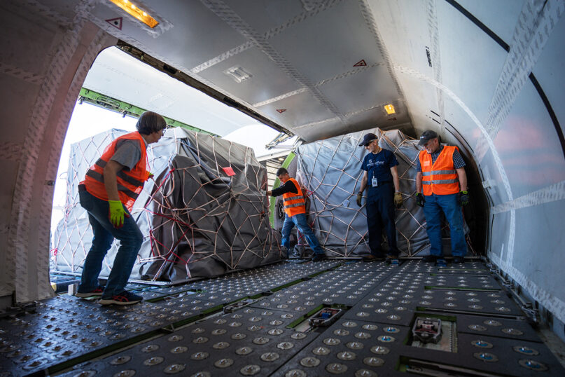 Samaritan's Purse team members load the organization's DC-8 aircraft on March 3, 2022 in North Carolina. On March 4th, the international Christian relief organization airlifted an Emergency Field Hospital to care for hurting families in Ukraine. Courtesy photo from Samaritan's Purse