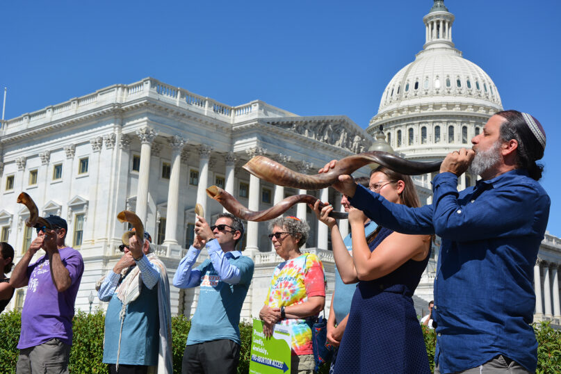 Shofars are blown outside the U.S. Capitol on Sept. 14, 2022, during an abortion rights event organized by the National Council of Jewish Women. RNS photo by Jack Jenkins