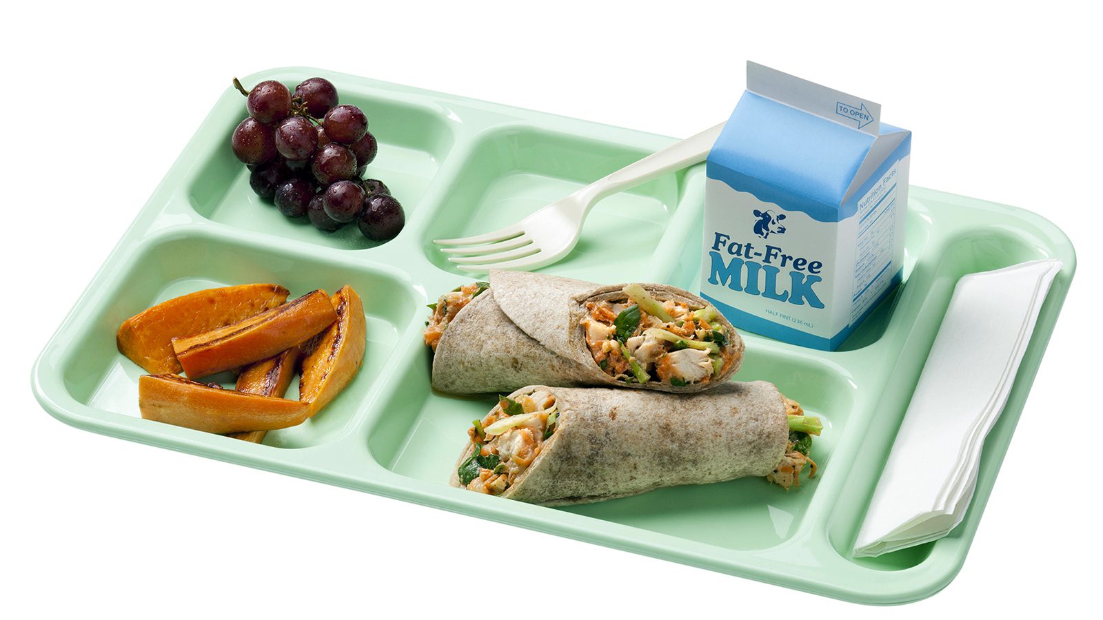 A school lunch tray showing a reimbursable meal for grades kindergarten through 8. Photo by USDA/Flickr/Creative Commons