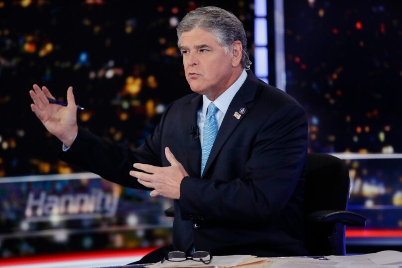 Fox News host Sean Hannity speaks during a taping of his show, 