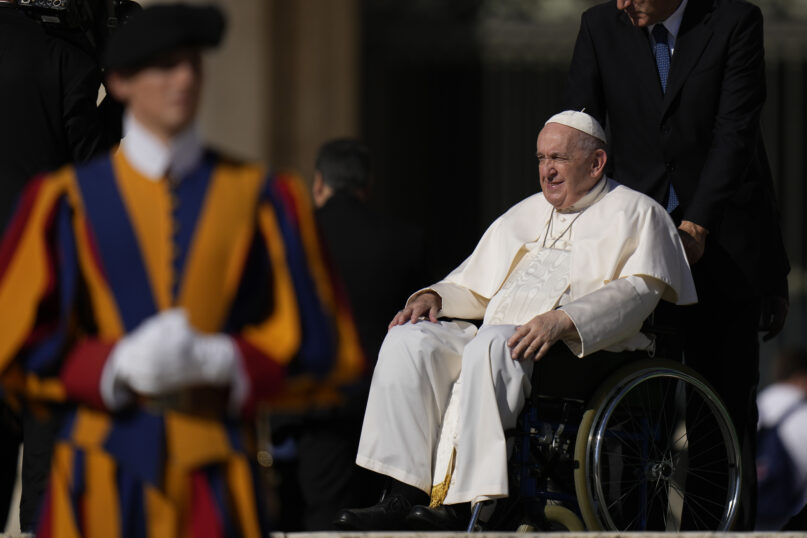 Pope Francis in a wheelchair attends his weekly general audience in St. Peter's Square at the Vatican, Wednesday, Oct. 5, 2022. (AP Photo/Alessandra Tarantino)
