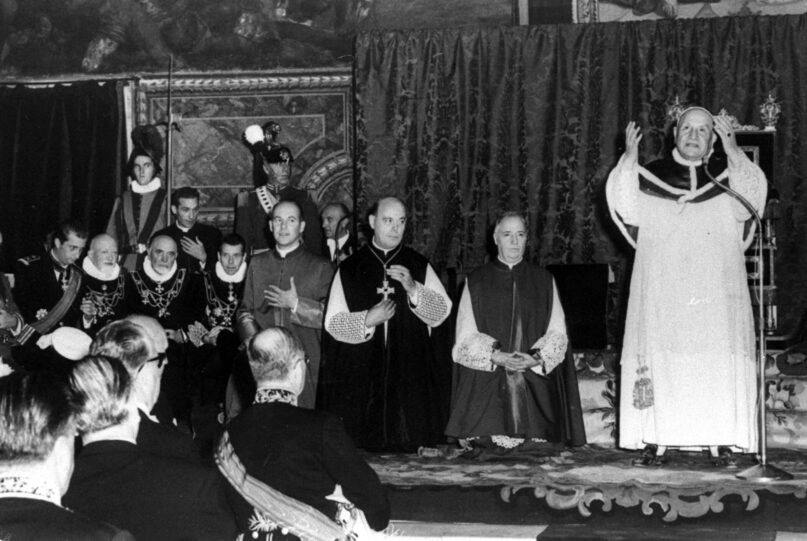 FILE - Pope John XXIII stands and prays in the Sistine Chapel in Vatican City, Oct. 12, 1962, during a special audience to delegates from foreign governments to the ecumenical council. Pope Francis commemorates the 60th anniversary of the opening of the Second Vatican Council by celebrating a Mass in honor of St. John XXIII, the “good pope” who convened the landmark meetings that modernized the Catholic Church. (AP Photo/File)