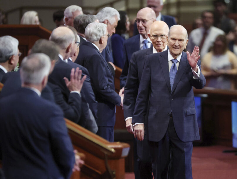President Russell M. Nelson, of The Church of Jesus Christ of Latter-day Saints, waves to other general authorities prior to the Saturday morning session of the 192nd semiannual General Conference of The Church of Jesus Christ of Latter-day Saints in Salt Lake City on Oct. 1, 2022.  (Jeffrey D. Allred /The Deseret News via AP)