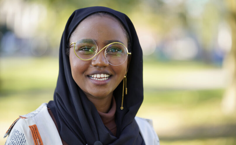 Mana Abdi, 26, a Democratic candidate for state legislature, speaks with a reporter, Thursday, Oct. 6, 2022, in Lewiston, Maine. She is running unopposed. Her Republican opponent, who had posted on Facebook that Muslims 