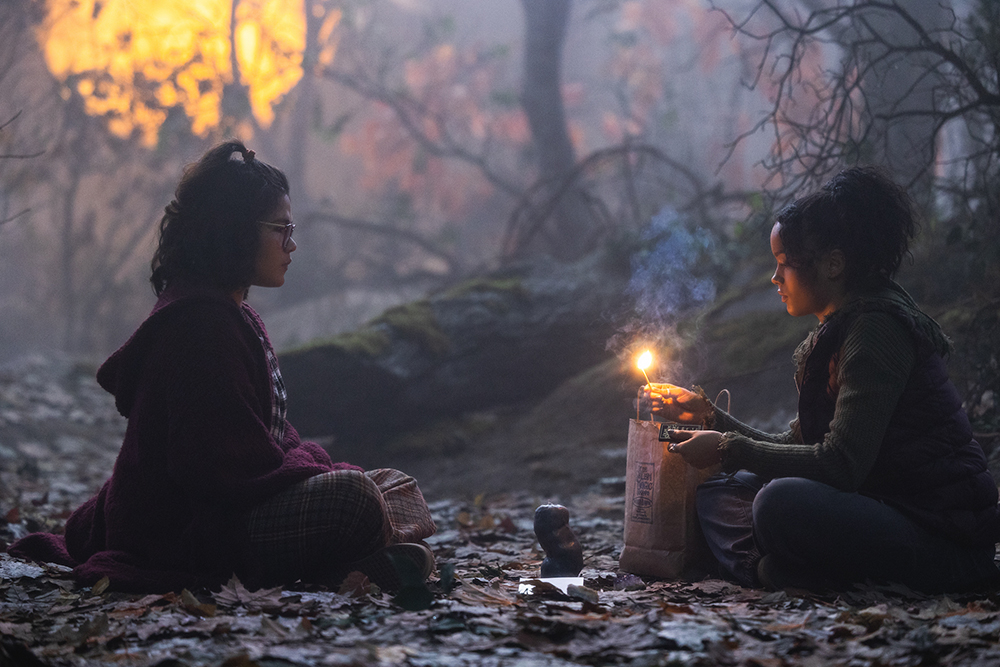 Belissa Escobedo as Izzy, left, and Whitney Peak as Becca in Disney's "Hocus Pocus 2," exclusively on Disney+. Photo by Matt Kennedy. © 2022 Disney Enterprises, Inc. All Rights Reserved.