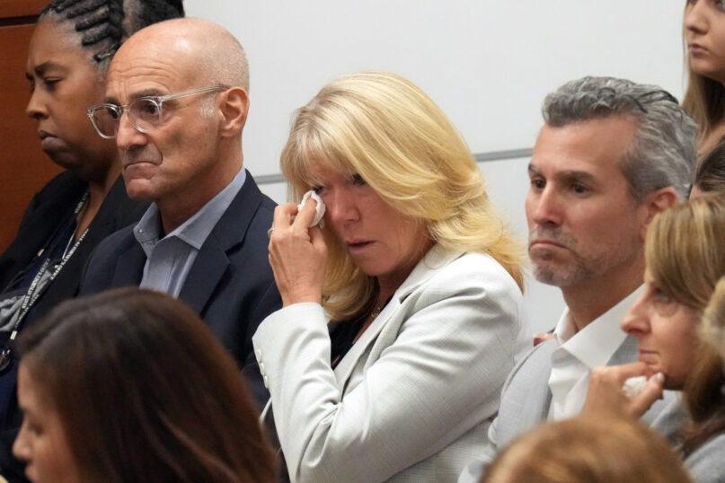 Mitch and Annika Dworet react as they hear that their son's murderer will not receive the death penalty as the verdicts are announced in the trial of Marjory Stoneman Douglas High School shooter Nikolas Cruz at the Broward County Courthouse in Fort Lauderdale, Fla. on Thursday, Oct. 13, 2022. The Dworet's son, Nicholas, was killed, and their other son, Alexander, was injured in the 2018 shootings. (Amy Beth Bennett/South Florida Sun Sentinel via AP, Pool)