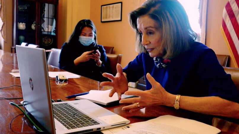 House Speaker Nancy Pelosi leads colleagues in prayer during a video conference on the morning of Jan. 6, 2021, at the U.S. Capitol. Video screen grab via Alexandra Pelosi/HBO