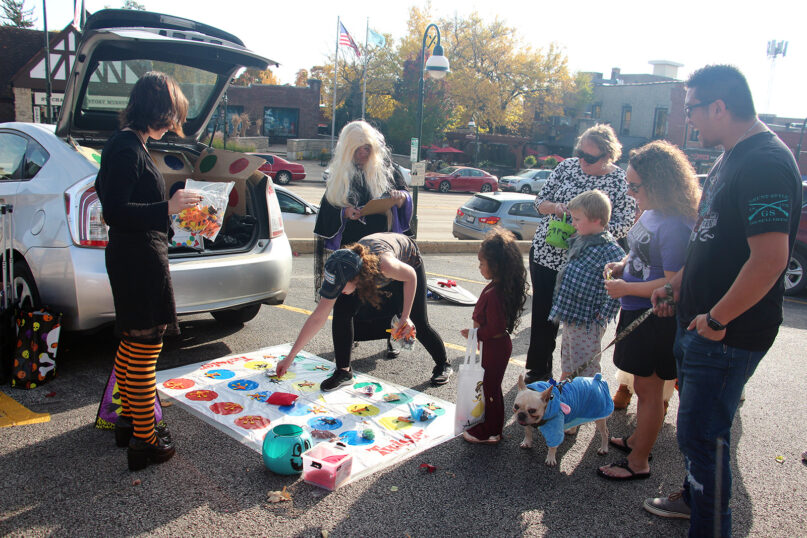 Attendees play games during the Baker Memorial United Methodist Church trunk or treat, Sunday, Oct. 23, 2022, in St. Charles, Illinois. RNS photo by Emily McFarlan Miller