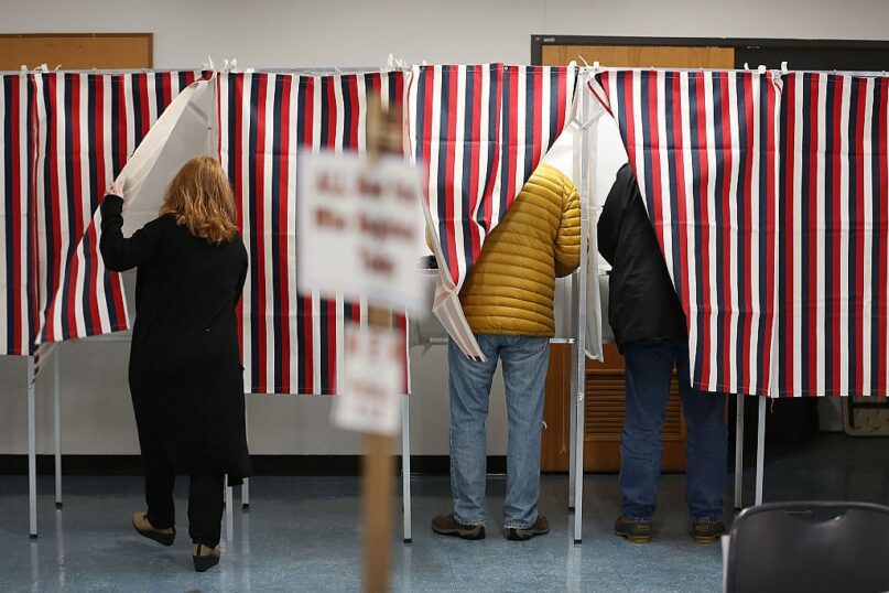 Religion shapes how many people vote – and lack of religion does, too.  (Joe Raedle/Getty Images News via Getty Images)