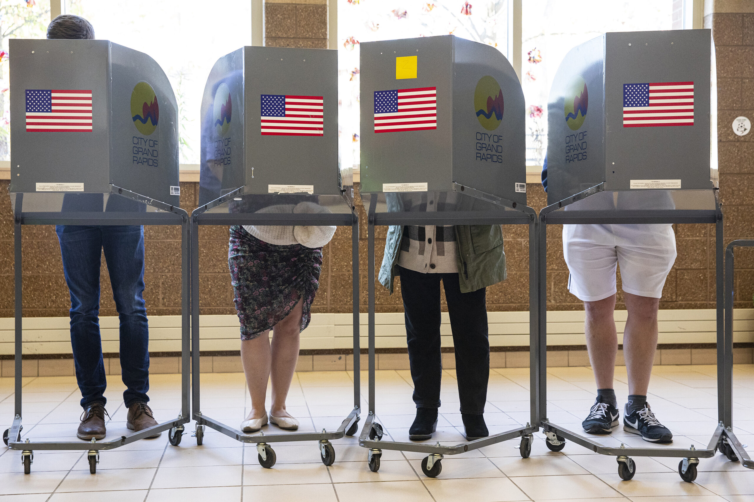 FILE - People cast their ballots at Coit Arts Academy in Grand Rapids, Michigan, on Tuesday, Nov. 8, 2022. (Joel Bissell/The Grand Rapids Press via AP, File)