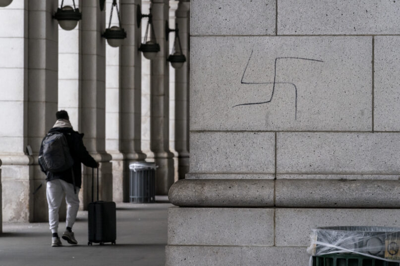 FILE - A hand-drawn swastika is seen on the front of Union Station near the Capitol in Washington, Jan. 28, 2022. The discovery this week of violently antisemitic graffiti along a popular Maryland walking trail is just the latest in a rising tide of anti-Jewish vandalism and activity dating back a decade, according to local Jewish leaders. (AP Photo/J. Scott Applewhite, File)