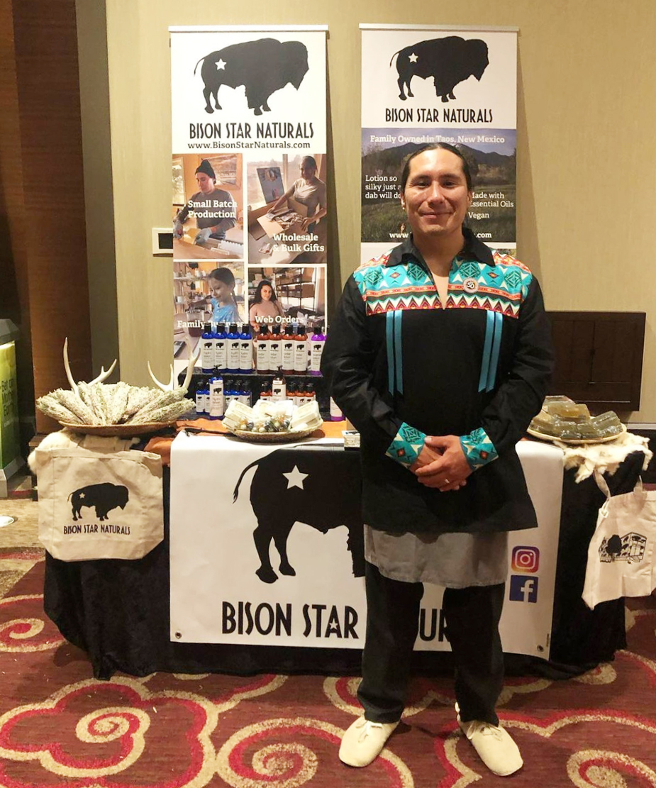 Angelo McHorse stands in front of his booth for Bison Star Naturals at the American Indian Alaska Native Tourism Association Conference in late October. Angelo founded Bison Star Naturals alongside his wife Jacquelene from their home in New Mexico. Photo courtesy Bison Star Naturals