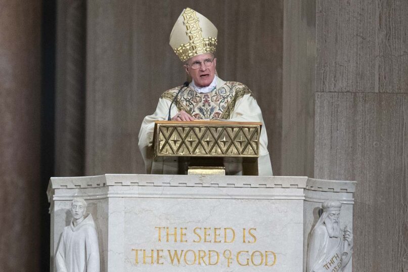 Archbishop Timothy Broglio conducts an Easter Sunday Mass in an empty sanctuary at Basilica of the National Shrine of the Immaculate Conception in Washington, April 12, 2020. Broglio, who oversees Catholic ministries to the U.S. armed forces, was elected Nov. 15, 2022, as the new president of the U.S. Conference of Catholic Bishops. (AP Photo/Jose Luis Magana)