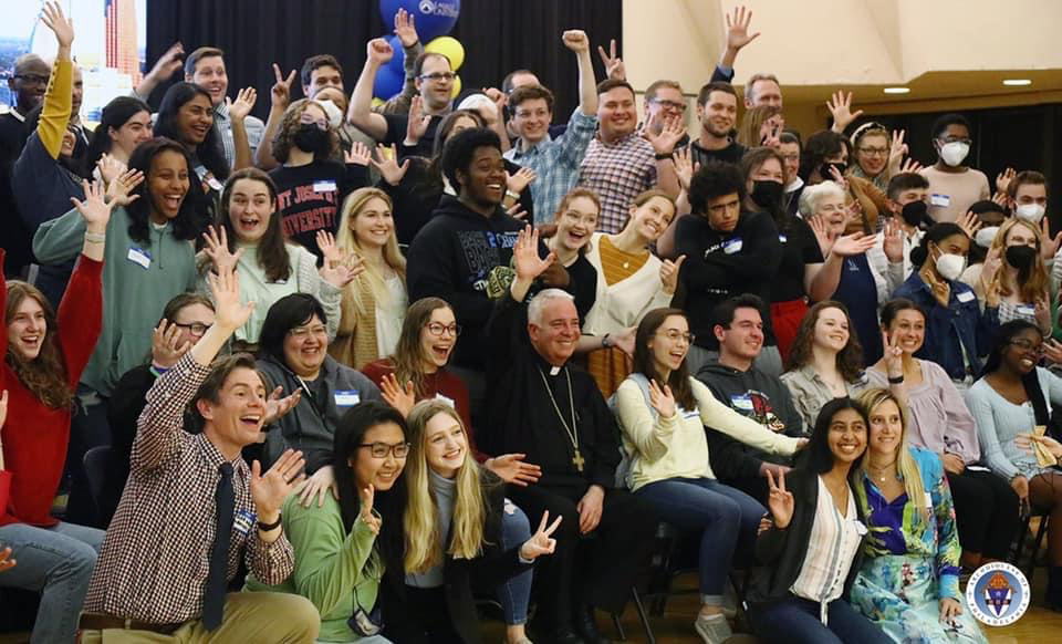 Archbishop of Philadelphia Nelson J. Perez, center bottom, poses with young adults and students during a Synod on Synodality listening session hosted at LaSalle University in Philadephia on April 4, 2022. Photo courtesy of the Archdiocese of of Philadelphia