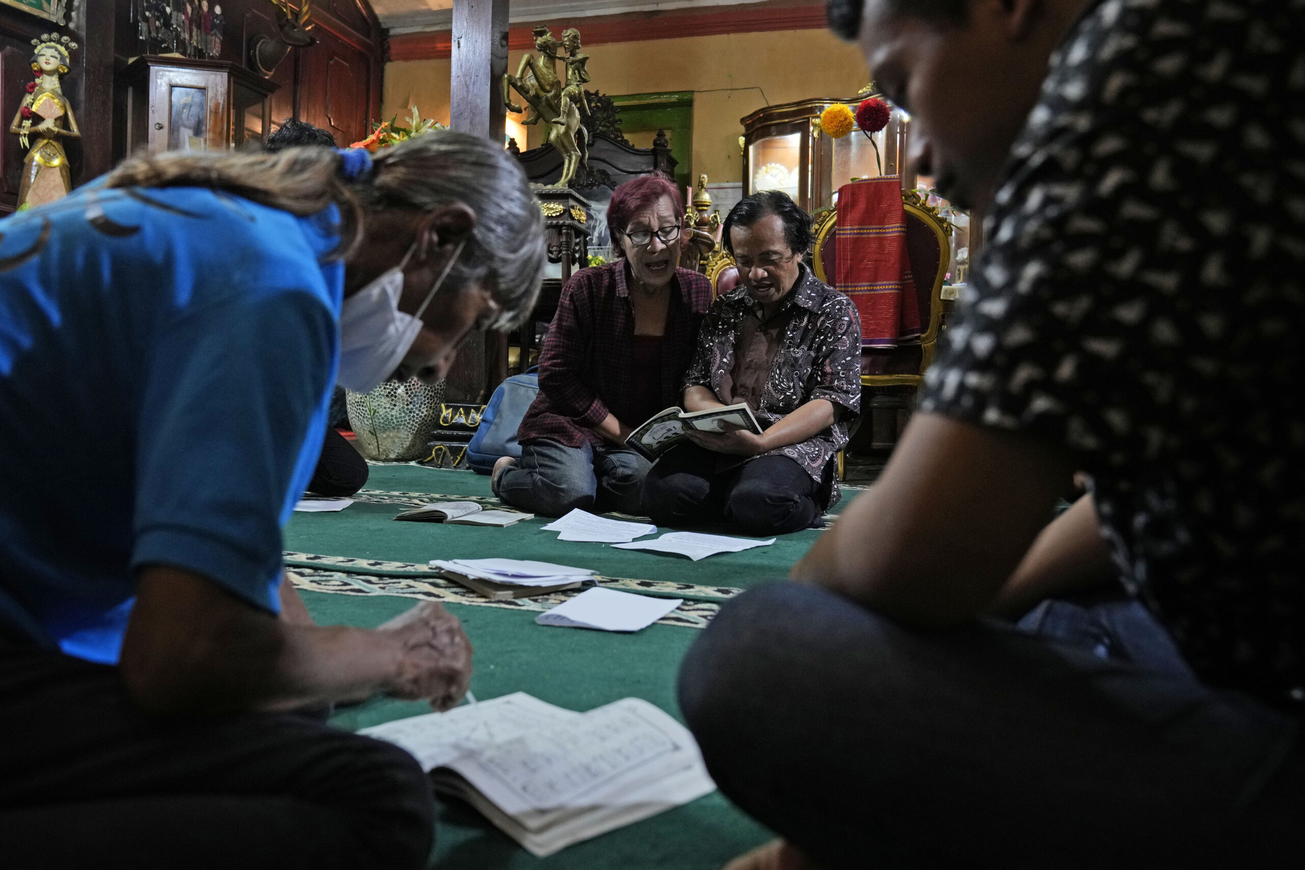 Trans women attend a Quran reading class at Al Fatah Islamic school for transgender women, in Yogyakarta, Indonesia, Sunday, Nov. 6, 2022. Compared to many Muslim nations, Indonesia is relatively tolerant. Scores of LGBTQ organizations operate openly, advocating for equal rights, offering counseling, liaising with religious leaders. (AP Photo/Dita Alangkara)