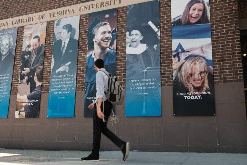 People walk by the campus of Yeshiva University in New York City. (Spencer Platt/Getty Images)