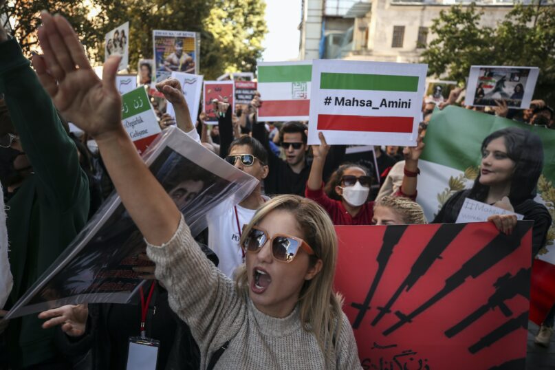 Protestors are pressing the Iranian regime for changes since the death of 22-year-old Mahsa Amini. (AP Photo/Emrah Gurel)