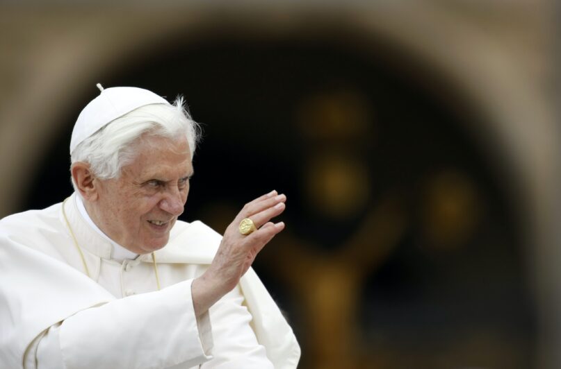 Pope Benedict XVI waves as he is driven through a crowd during his weekly general audience, in St. Peter's Square at the Vatican, on June 2, 2010. (AP Photo/Andrew Medichini)