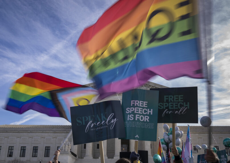 People on both sides of the debate rally outside the Supreme Court in Washington, Monday, Dec. 5, 2022. The Supreme Court is hearing the case of a Christian graphic artist who objects to designing wedding websites for gay couples, that's the latest clash of religion and gay rights to land at the highest court. (AP Photo/Andrew Harnik)