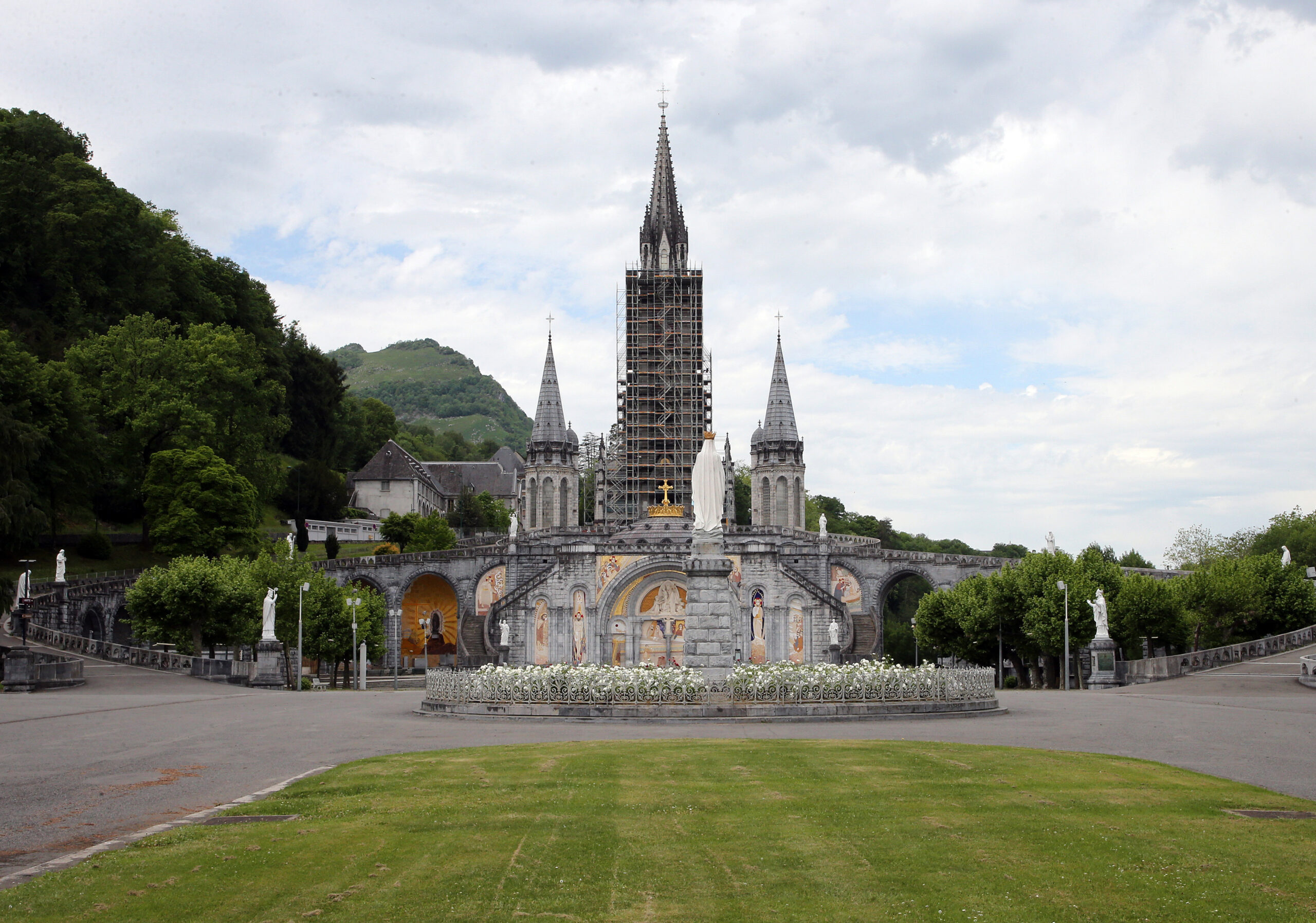 FILE - The closed Basilica of Lourdes is pictured May 8, 2020, in Lourdes, southwestern France. The Vatican came under pressure Tuesday, Dec. 6, 2022, to explain why it didn’t prosecute a famous Jesuit artist and merely let his order restrict the priest's ministry following allegations that he abused his authority over adult women. Mosiacs by Rev. Marko Ivan Rupnik decorate several churches and chapels, including the Lourdes basilica. (AP Photo/Bob Edme, File)