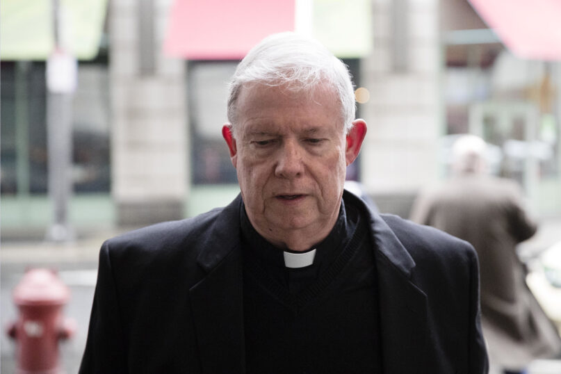 FILE – Monsignor William Lynn arrives for a preliminary hearing in his retrial of his child endangerment case at the Center for Criminal Justice in Philadelphia, March 28, 2017. Lynn, the longtime secretary for clergy, was accused of sending a known predator, named on a list of problem priests he had prepared for Cardinal Bevilacqua, to an accuser’s northeast Philadelphia parish. Lynn served nearly three years in state prison before appeals courts threw out his felony child endangerment conviction, and he pleaded no contest in November 2022 to a misdemeanor charge of failing to turn over records to the 2002 grand jury. (AP Photo/Matt Rourke, File)