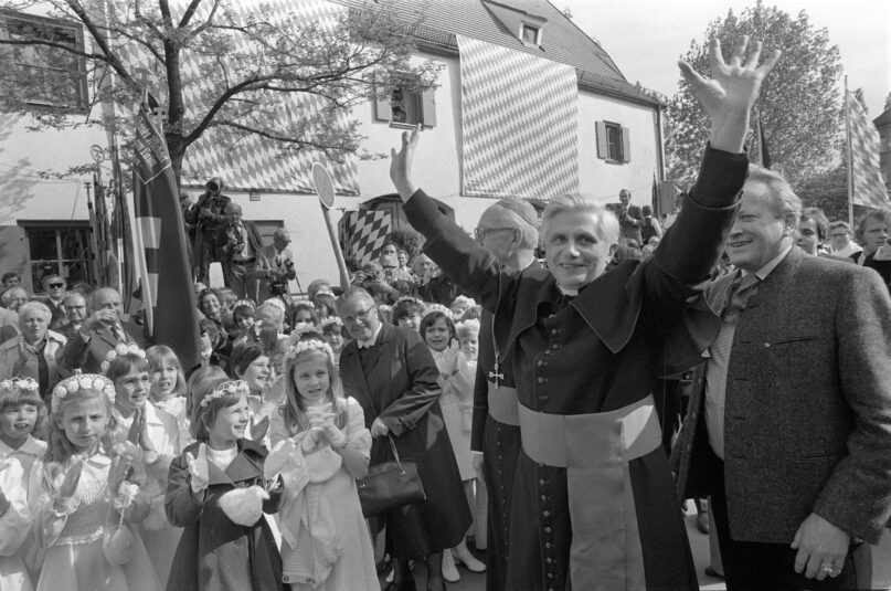 FILE - Joseph Ratzinger, the new archbishop of Munich and Freising, raises his arms to greet believers at his arrival in the Bavarian capital of Munich, Germany, on May 23, 1977. Pope Emeritus Benedict XVI, the German theologian who will be remembered as the first pope in 600 years to resign, has died, the Vatican announced Saturday. He was 95. (AP Photo/Dieter Endlicher, File)