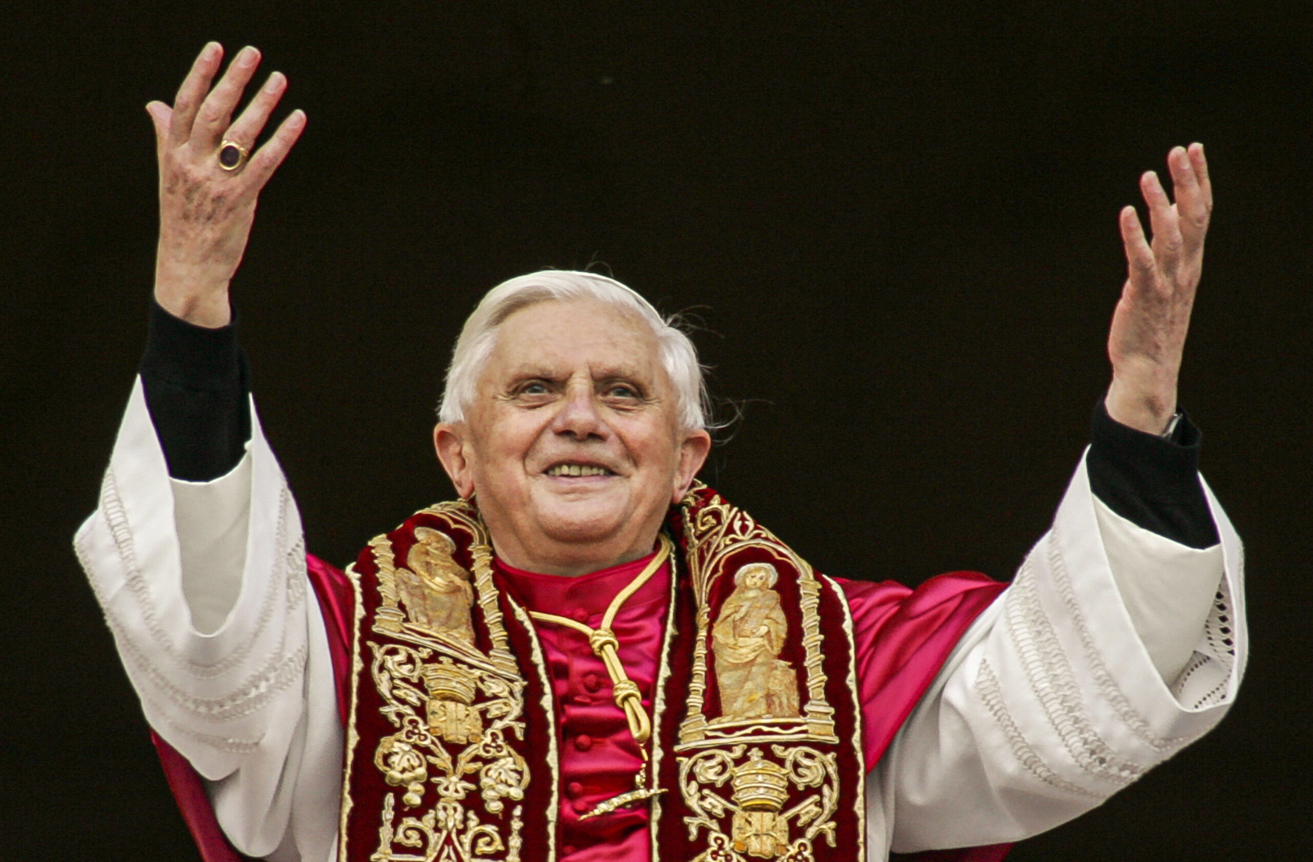 Pope Benedict XVI greets the crowd from the central balcony of St. Peter's Basilica at the Vatican on April 19, 2005, soon after his election. (AP Photo/Andrew Medichini, File)