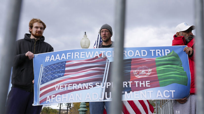 Demonstrators gather to support new Afghan immigrants and the Afghan Adjustment Act outside the Capitol in Washington, Nov. 16, 2022. (AP Photo/Mariam Zuhaib)