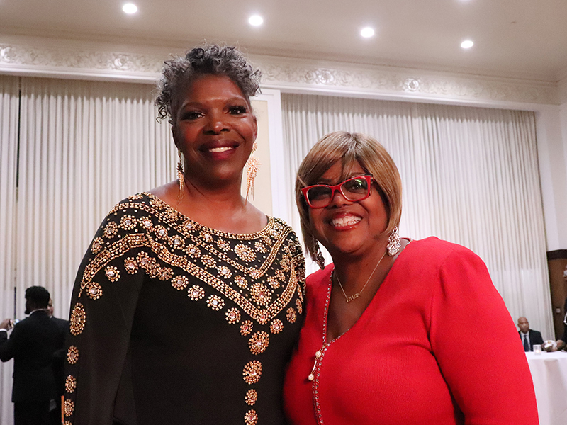 The Rev. Ammie L. Davis, left, and the Rev. Suzan Johnson Cook pose together at a Black Women in Ministry event at the National Press Club, Friday, Dec. 2, 2022, in Washington. RNS photo by Adelle M. Banks