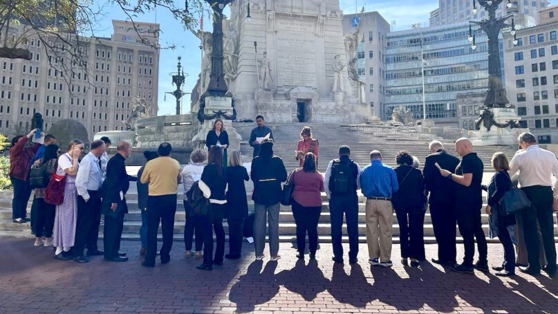 Attendees of the Christian Churches Together annual forum participate in a prayer pilgrimage starting at Monument Circle in downtown Indianapolis during the October 2022 meeting. Photo courtesy of CCT