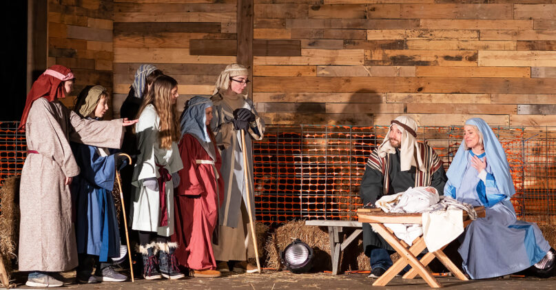 Mary and Joseph sit with their baby as they talk with the visiting wise men during the live Nativity performance by Kenosha Bible Church. Photo courtesy of Kenosha Bible Church