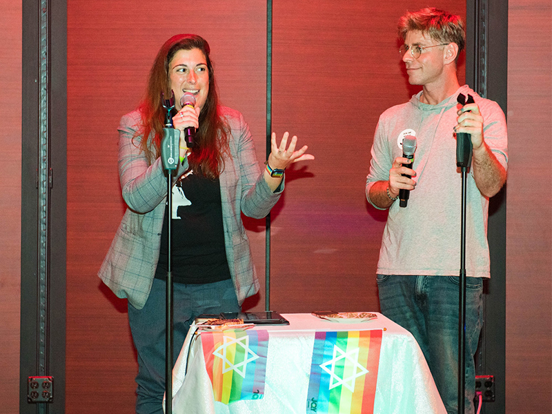 JQY Executive Director Rachael Fried, left, and Founder and Clinical Director Mordechai Levovitz, right, at JQY's annual community event for the Jewish festival of Sukkot, on Oct. 22, 2022, in New York City. Photo by Justin Haim