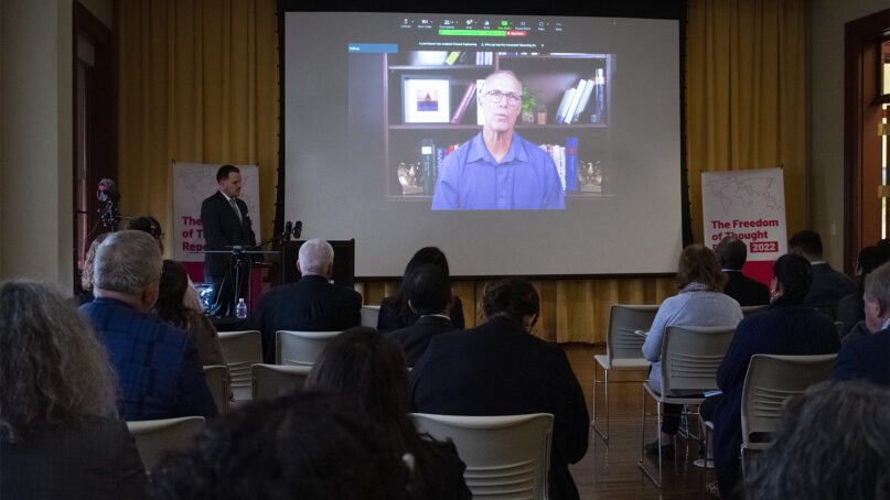 U.S. Rep. Jared Huffman, center, virtually addresses a meeting about the rights of nonreligious people around the world, Thursday, Dec. 8, 2022, in Washington. Photo courtesy of American Atheists