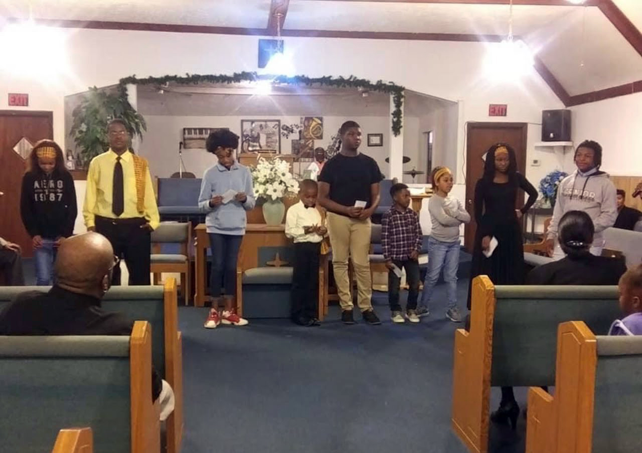Youth give presentations on Black history at Mattie Richland Baptist Church in Pineview, Georgia. Photo by Ja'Qwan Davenport