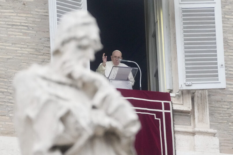 Pope Francis delivers the Angelus noon prayer in St. Peter's Square at the Vatican, Sunday, Jan. 15, 2023. (AP Photo/Gregorio Borgia)