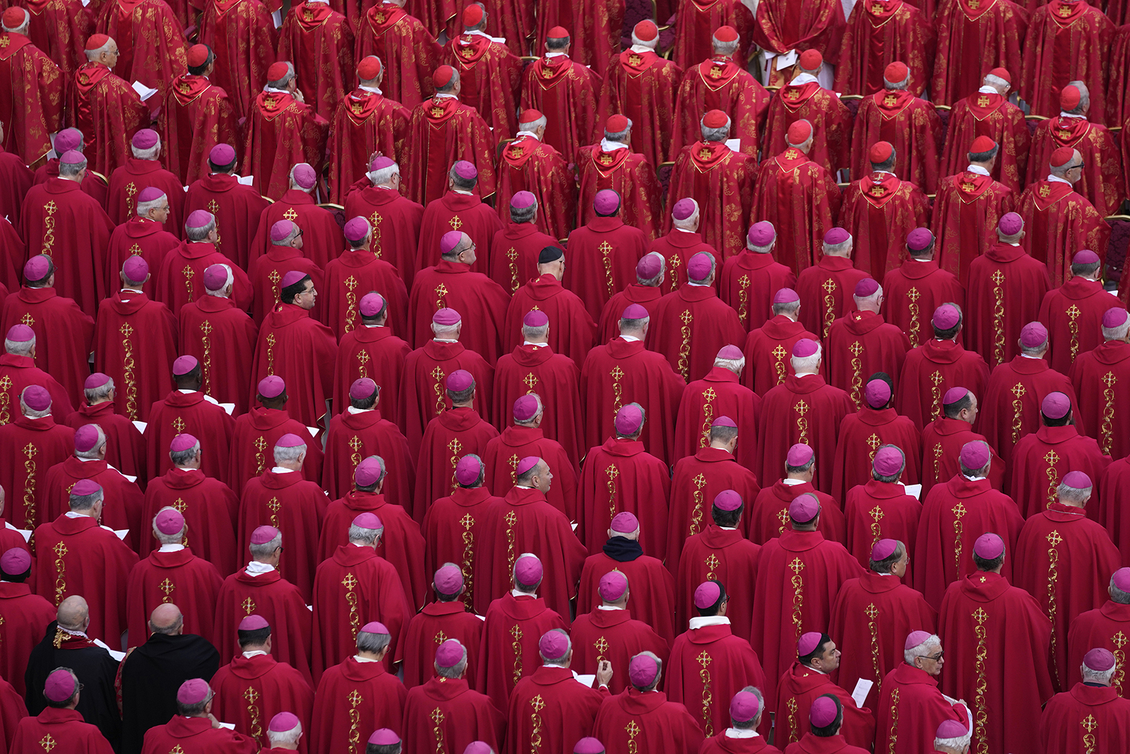 Bishops and cardinals attend the funeral mass for late Emeritus Pope Benedict XVI in St. Peter's Square at the Vatican, Thursday, Jan. 5, 2023. (AP Photo/Ben Curtis)