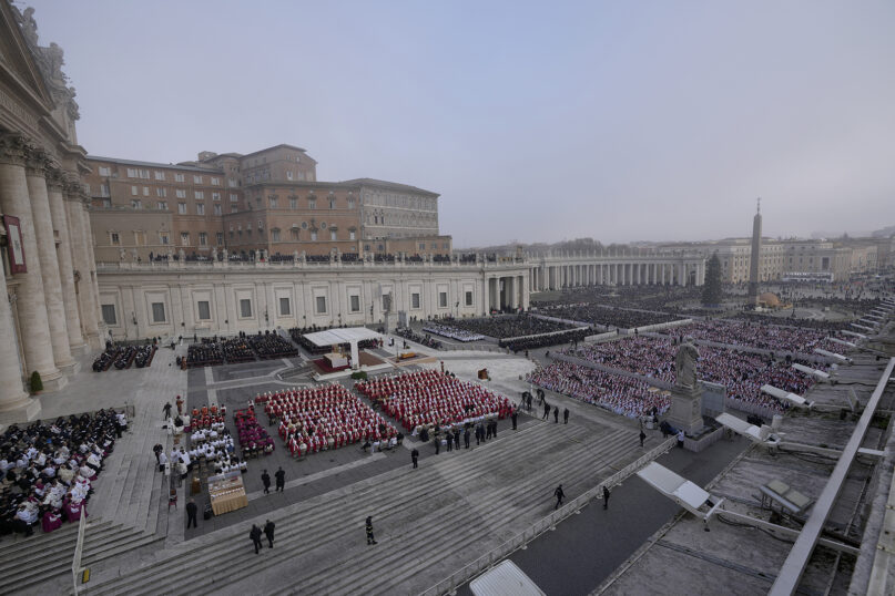 Faithful attend the funeral Mass for Emeritus Pope Benedict XVI in St. Peter's Square at the Vatican, Jan. 5, 2023. Benedict died at 95 on Dec. 31 in the monastery on the Vatican grounds where he had spent nearly all of his decade in retirement. (AP Photo/Ben Curtis)