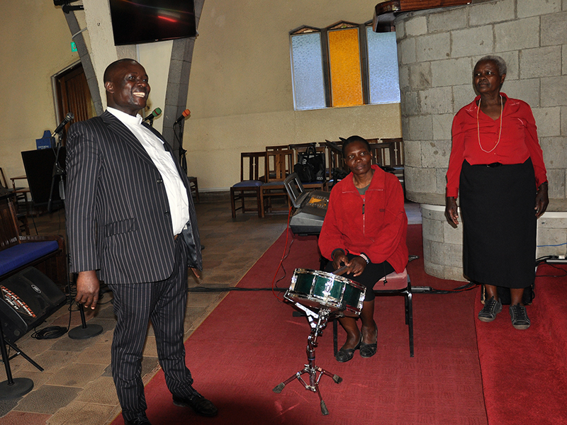 Pastor George Obonyo rehearses with the Praise to Zion team at St. Andrew's Church in Nairobi, Kenya, January 2023.  RNS Photo courtesy of Fredrick Nzwili