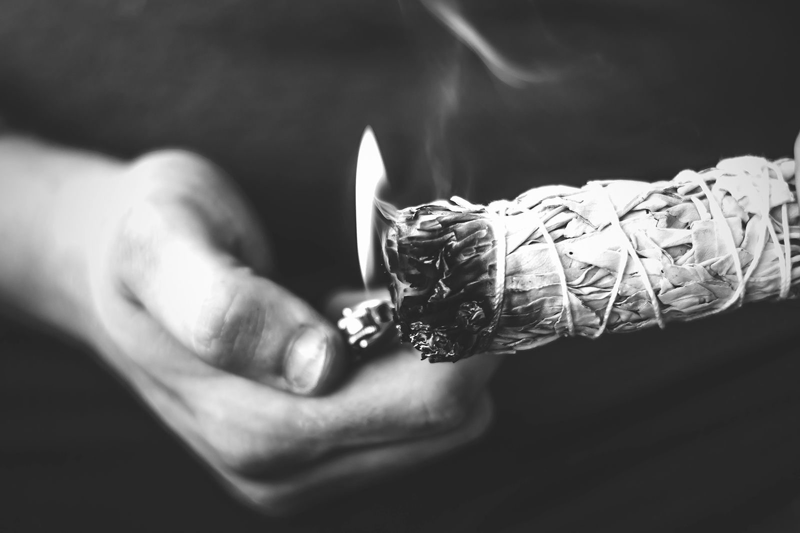 Bundled white sage is burned. Photo by Brittany Colette/Unsplash/Creative Commons