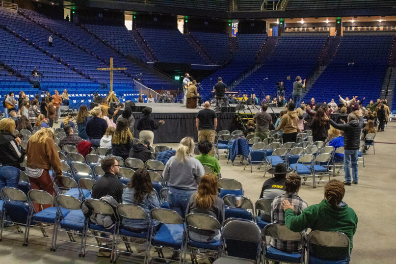 People attend a revival event led by evangelist Nick Hall at Rupp Arena in Lexington, Kentucky, Feb. 26, 2023. Photo by Fiona Morgan