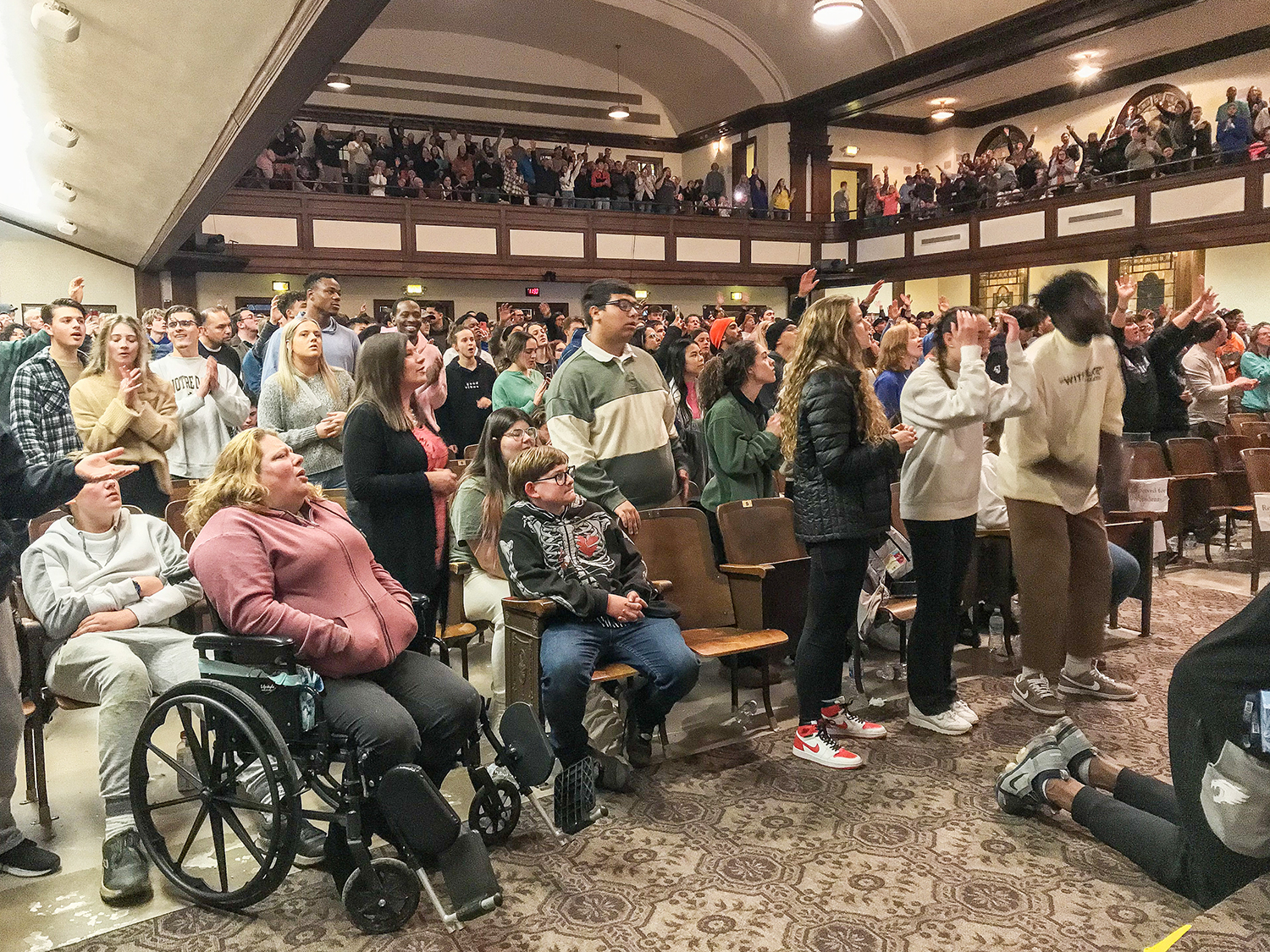 People join together to worship inside Hughes Auditorium. Photo by Fiona Morgan
