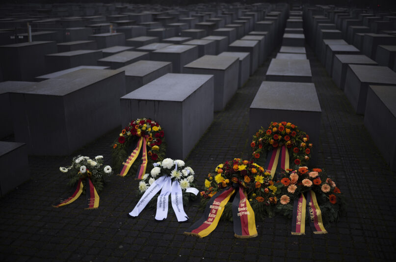 Wreaths are placed at the Memorial to the Murdered Jews of Europe on the International Holocaust Remembrance Day in Berlin, Jan. 27, 2023. (AP Photo/Markus Schreiber)