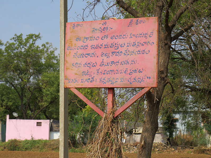 A notice board that says everyone is a Hindu in this village, at the entrance to the Kesalingayapalli village in Andhra Pradesh, India. Photo by Priyadarshini Sen